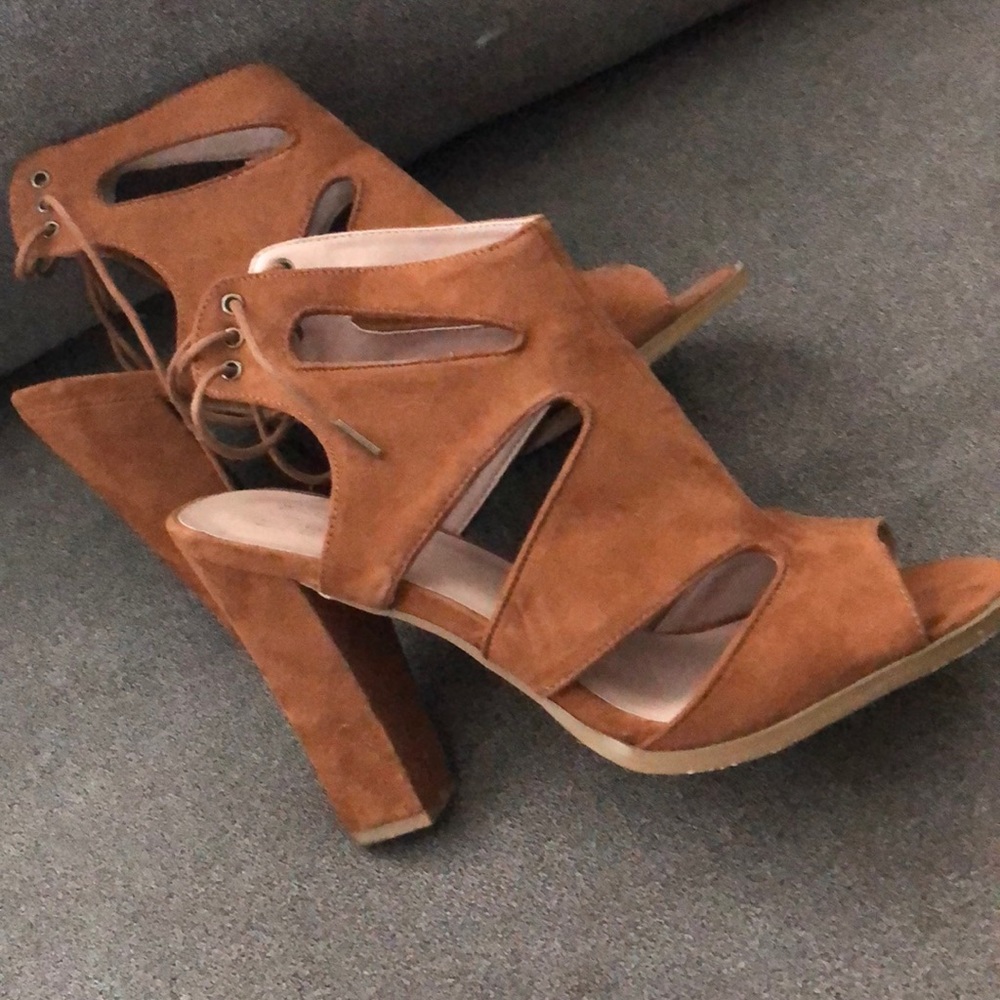 Suede heels with lace up in the back!